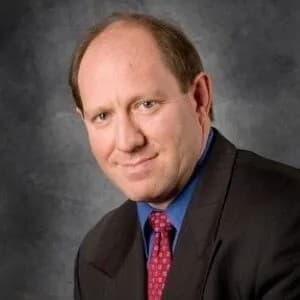 Bruce E.  Gudin