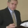 Michael  Manoussos, Esq.